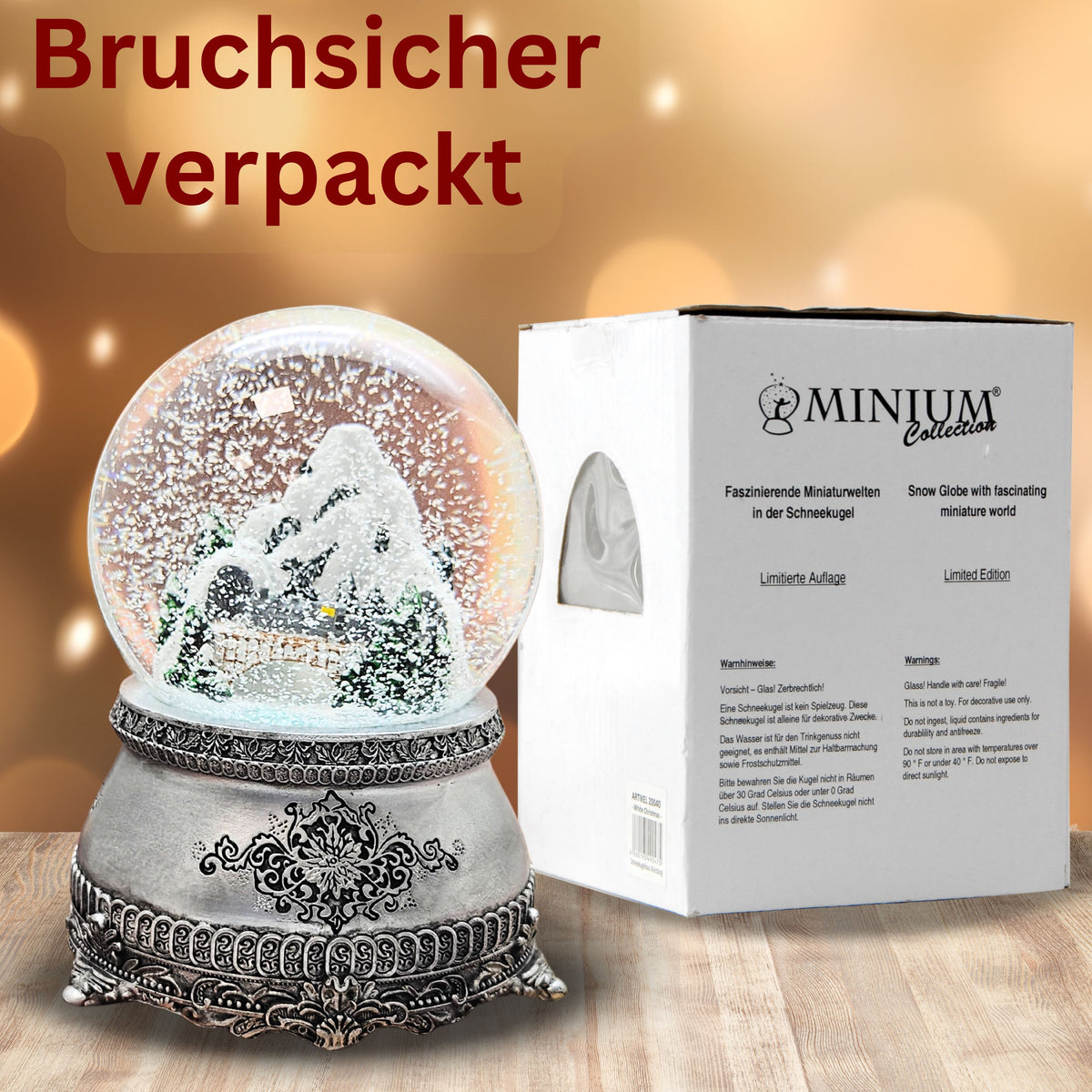 Nostalgische Schneekugel Berglandschaft mit Brücke auf Zinnsockel 100 mm Durchmesser mit Spieluhr